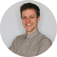 Shane Boothbly standing in front of grey wall | Chambers USA